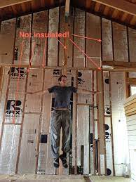 Many builders put up a 2×4 wall on the interior side of the foam insulation; How We Turned Our House Into A Giant Foam Box Part I Wall Insulation Frugal Happy