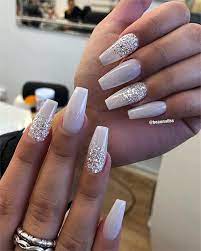 Just don't overwhelm them with lots of faux we are sure sparkling white acrylic nails will not leave you indifferent. 50 Amazing Glitter Nails Designs Nail Art Connect Glitter Nails Coffinnails White Acrylic Nails Bride Nails Christmas Nails Acrylic