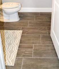 The line crossing at the room's center are the starting point of the tile. Big Tile Or Little Tile How To Design For Small Bathrooms And Living Spaces On Suncoast View Tile Outlets Of America