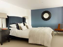 75 carpeted bedroom with blue walls