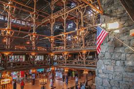 The old faithful inn is a hotel located in yellowstone national park, wyoming, united states, with a view of the old faithful geyser. Old Faithful Inn Interior Photograph By Kevin Craft