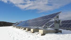 in winter snow on solar panels