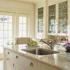 white kitchen cabinets with glass doors