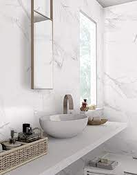 Blue bathroom with white marble sink. Matt White Marble Effect White Marble Tile Bathroom Marble Tile Bathroom White Marble Bathrooms