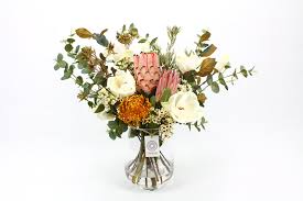 Get free shipping on qualified floral arrangements, outdoor artificial flowers or buy online pick up in store today in the home decor department. Native Protea And Magnolia Artificial Flower Arrangement Floralistic
