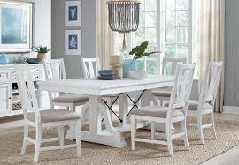 White is an easy colour to match, and looks especially good with modern, glossy dining sets, as well as more classic, rustic looks such as a wooden farmhouse table. Magnussen Heron Cove White Dining Table And Four Chairs