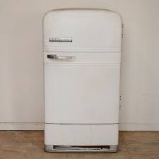 White refrigerator door shelf bin, bottom. Vintage Westinghouse Refrigerator Ebth
