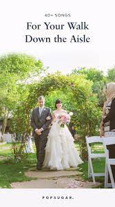 Bride and father walking down the aisle. Wedding Processional Songs Popsugar Entertainment