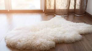 Shake or vacuum the rug to remove the baking soda and comb to lift the fibers. How To Clean A Sheepskin Rug Using Easy Methods Homenish