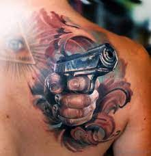 Gun holster tattoos pictures 5. 33 Great Gun Tattoos With Meanings And Celebrities Body Art Guru