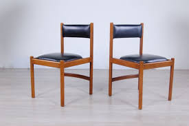As a rule, natural leather is much more expensive than faux one, hence why should pay much and get low quality product? Italian Modern Leather And Wood Dining Chairs From Isa 1960s Set Of 2 For Sale At Pamono