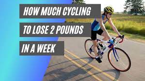 how much cycling to lose 2 pounds 1kg
