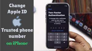 change apple id trusted phone number on