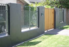 a front fence apinted to integrate with