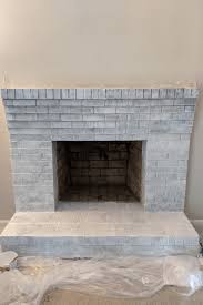 how to whitewash brick fireplace with