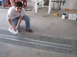 Applying a suitable garage floor covering to a concrete garage floor can be a great idea to both protect it and give it a visually appealing finish. Can I Put A Floor Drain In My Garage Garage Transformed