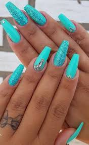 Are you searching for new nail designs for short nails? Sea Green Nail Polish With Glitter Accents Bright Summer Nails Designs Turquoise Nails Turquoise Nail Designs