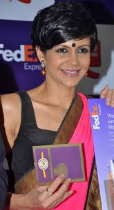 Bollywood host and Cricket presenter Mandira Bedi during the launch of FedEx CCD Rakhi Offer 2013 in Mumbai, on August 12, 2013.Updated August 13, 2013 - mandira-bedi-launches-fedex-ccd-rakhi-offer-2013-55613