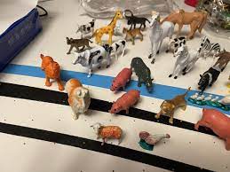 lot of miniature plastic toy farm