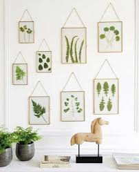 Bronze Picture Frames Hanging On Walls