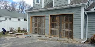 Your wooden garage door has a lot to say about your home design. Vinity Vintage Style Custom Reclaimed Wood Garage Door Lux Garage Doors