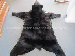 black bear skins tanned and black