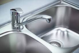 to clean a stainless steel kitchen sink