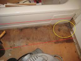 rotten suloor under bathtub and