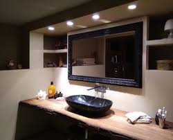 Hm, the white veins in the tile is interesting. Four Downlight Spot To Lighting The Black Marble Sink And The Rough Wooden Top Plane Lightingand Bathroom Light Marble Sinks Marble Bathroom Wooden Tops