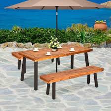 There is a 2 hole for umbrella in middle of table, lid (wooden cap) provided to cover hole when umbrella not in use. Costway Acacia Wood Outdoor Dining Table Patio Rectangle Table W Umbrella Hole Brown
