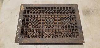 antique cast iron floor furnace grate