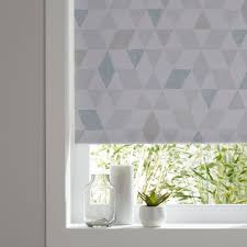 white triangle blackout roller blind