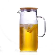 glass juice and iced tea pitcher with