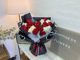 red and white roses bouquet in chino