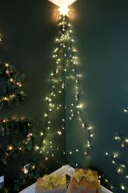 christmas tree on the wall with lights