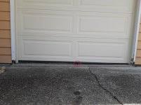 severely uneven gap at garage door