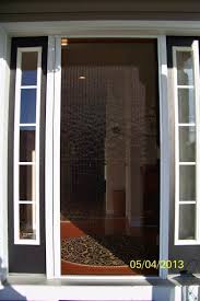 When i open my sliding door with a screen, i place a baby gate in front. Cat Proof Retractable Screen Door Is It Possible Retractable Screens For Doors Windows