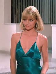The film role that catapulted michelle pfeiffer to stardom, 'scarface' is a gritty (and gorey) film that portrays the rise and fall of a drug lord in miami. Elvira Hancock Blue Dress Scarface Costume