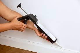how to easily caulk baseboards this