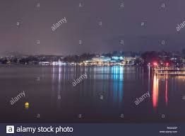 Cityscape At Night With Lake Zurich And Mountain In