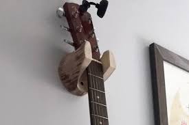 guitar hanger rustic log wall mounted