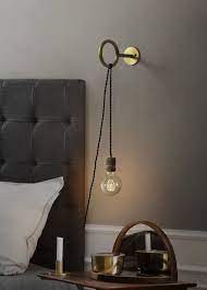 circus loop brass wall light with wall