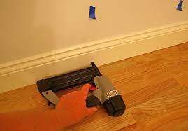 installing baseboard with coped cuts at