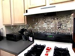 Creating a plumb, or perfectly vertical, line from the countertop up to the cabinetry is a good way to do that. Weekend Projects How To Install A Tin Tile Backsplash Hgtv