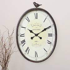 Metal Wall Clock With Bird Finial