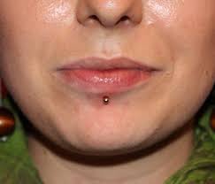 bottom lip piercing pain aftercare