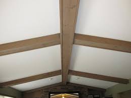 painting or staining rough wood beams