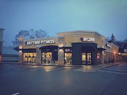 anytime fitness franchise costs fees