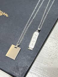 silver chain with rectangle pendant