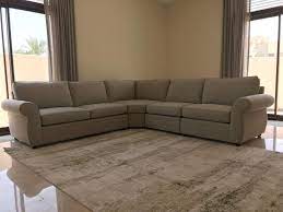 l shaped sofa installed on the palm